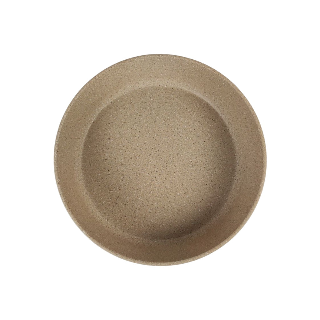 Brown ceramic plate on a white background