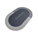 Gray and black oval mat with 'Bathroom' text on a white background