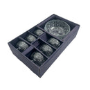 Set of six glass bowls with a decorative pattern in a navy blue box on a white background