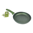 Green frying pan with a handle and packaging on a white background