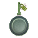 Green frying pan with a handle on a white background