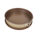 Brown springform pan on a white background