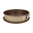 Round metal baking pan with a handle on a white background