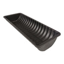 Black tray with ribbed design on a white background