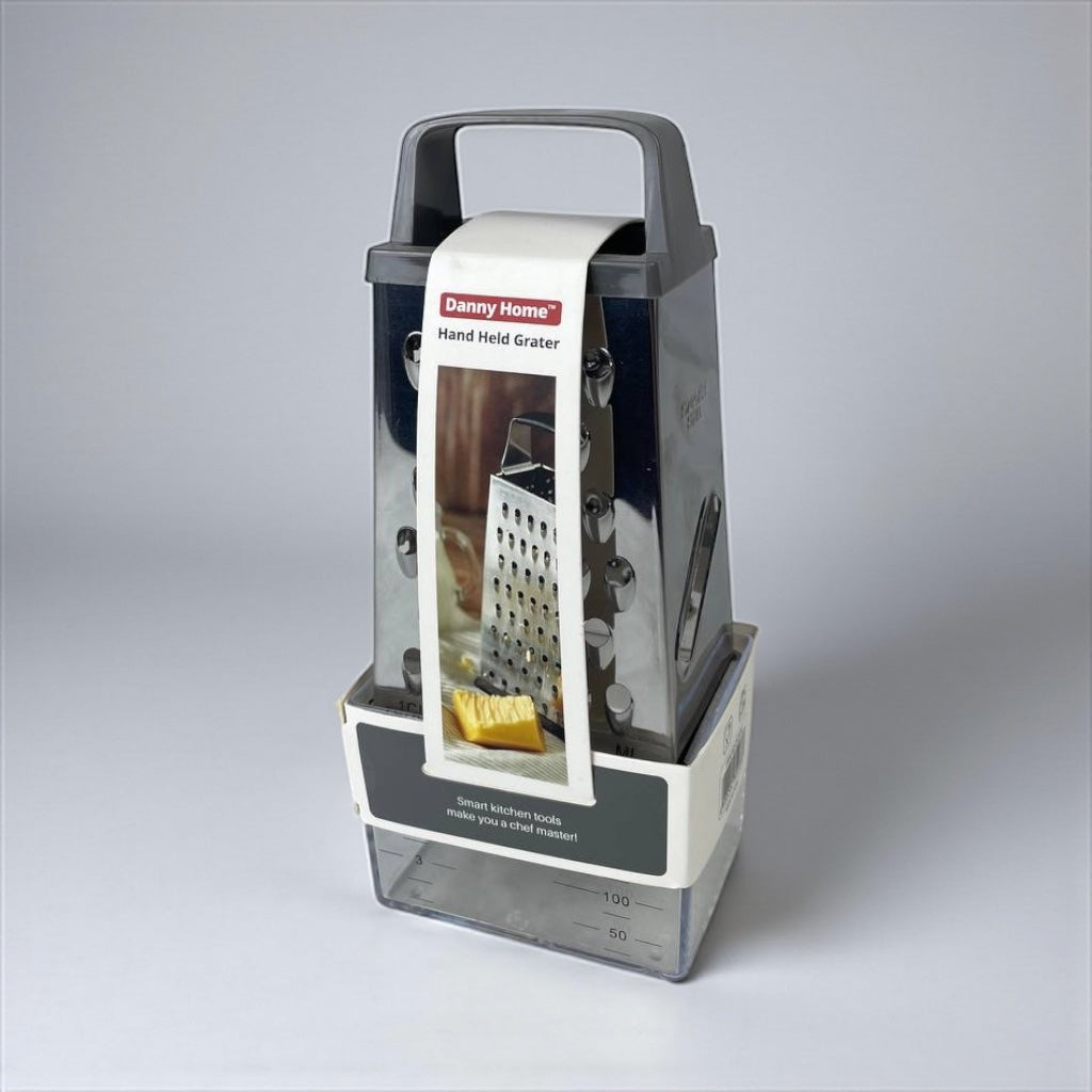 Handheld grater with packaging on a gray background available at cupindy.com