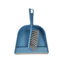 Blue dustpan and brush set on a white background