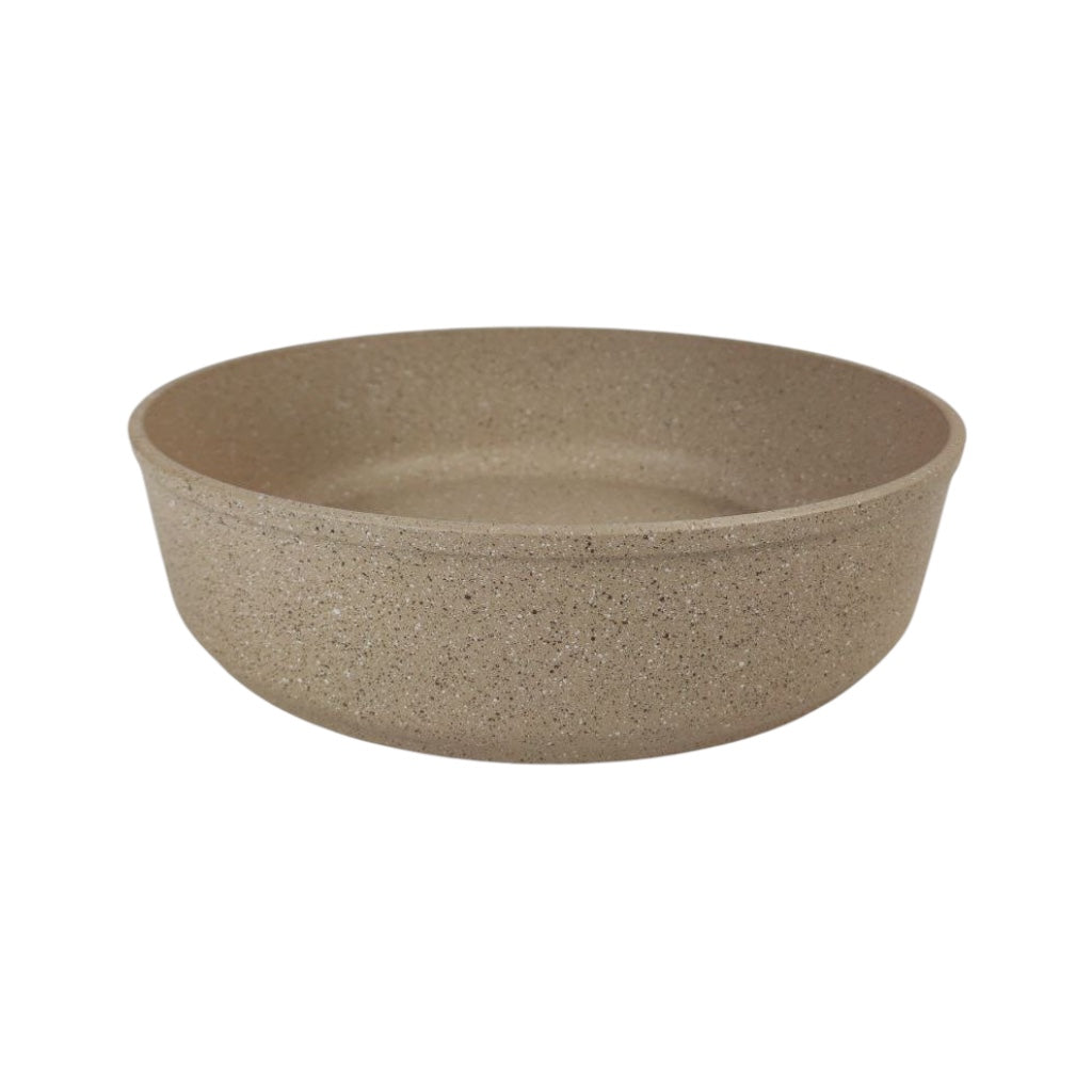 Beige ceramic bowl on a white background