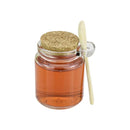 Transparent spice jar with eco-friendly cork seal and dipper spoon