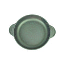 Green speckled ceramic dish on a white background