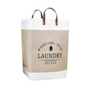 Laundry basket with 'Wash Dry Iron Laundry Deluxe' text and tree symbol on a white background