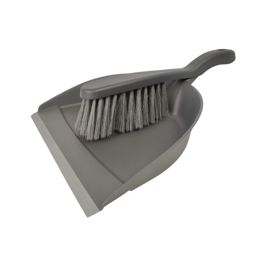 Gray dustpan and brush set on a white background
