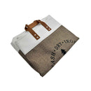 Folded towel with text and handles on a white background
