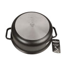 Black cast iron pot with lid and Risoli tag on a white background