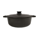 Black cast iron cookware pot with lid on a white background