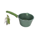 Green measuring cup with handle on a white background