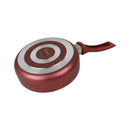 Red frying pan with a target design on a white background