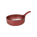 Red frying pan with speckled pattern on a white background