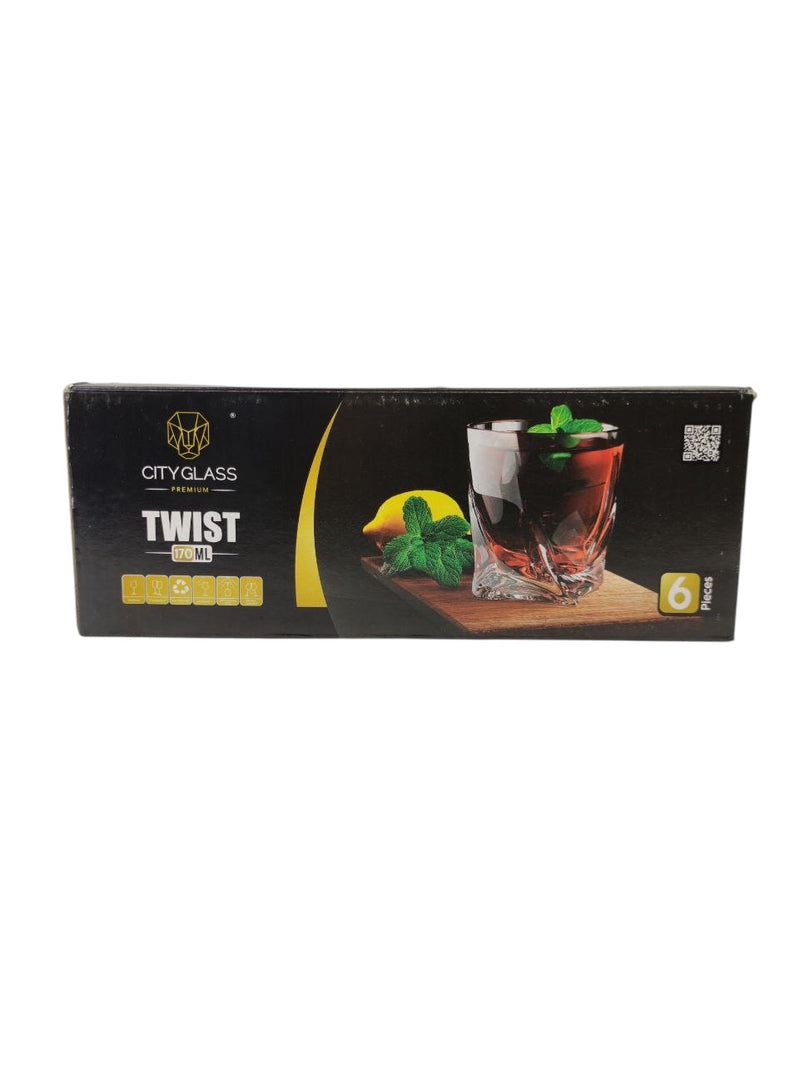 Box of City Glass Twist tumblers with a glass of beer and garnishes on a white background