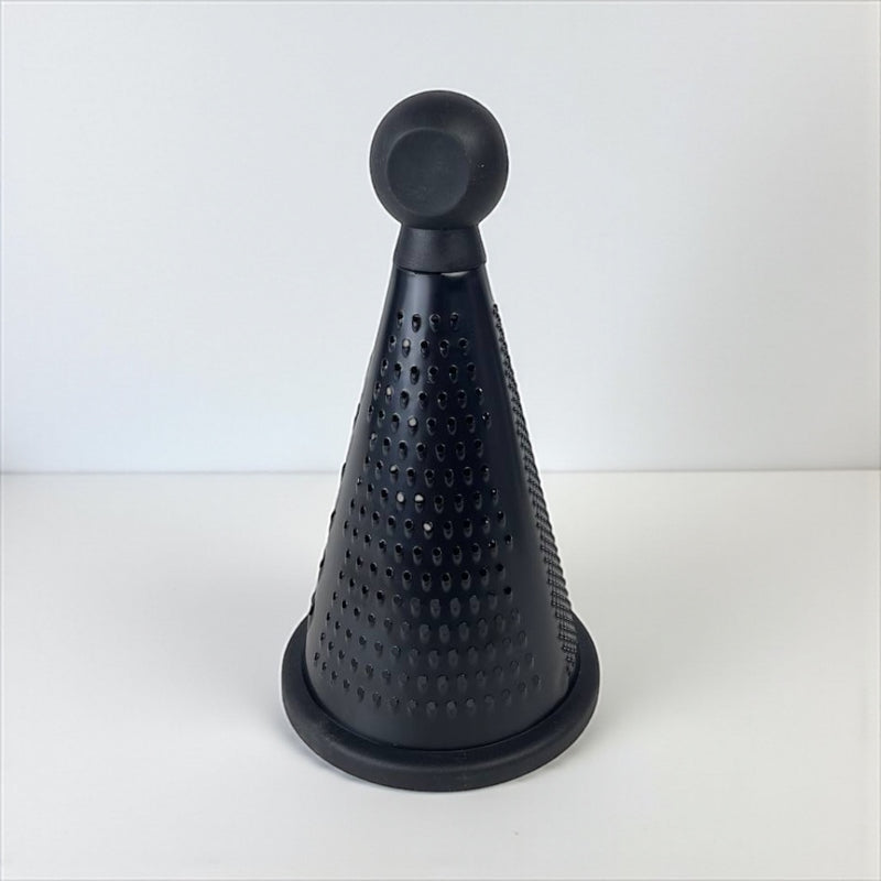 Black cone-shaped kitchen tool on a white background