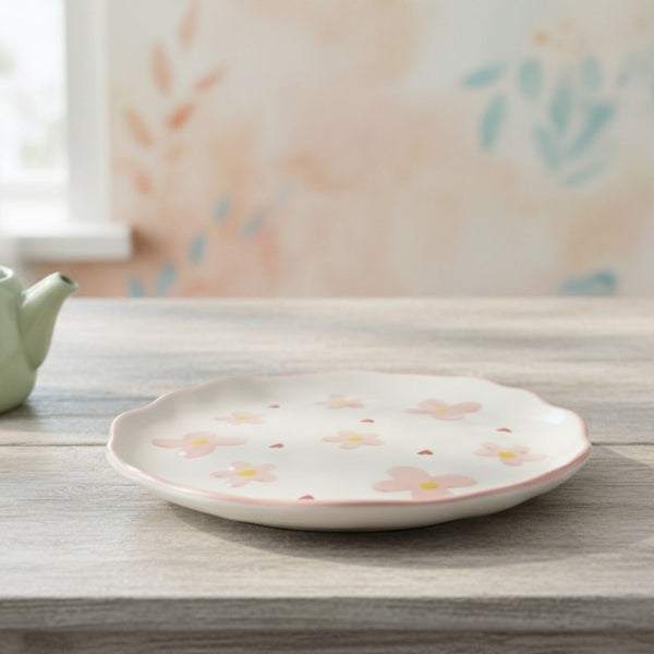 Decorative plate with floral pattern on a wooden surface