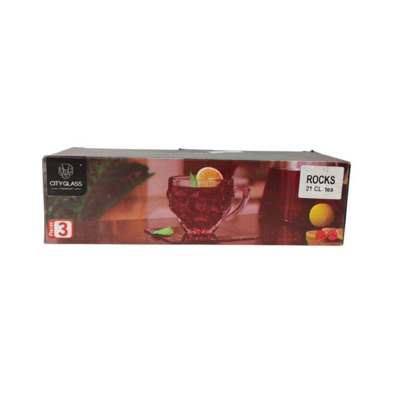 Box of City Glass glasses with a glass of red liquid and fruit on a white background
