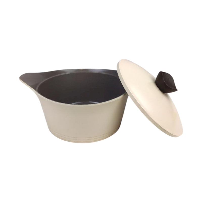 Beige pot with a black interior and beige lid on a white background