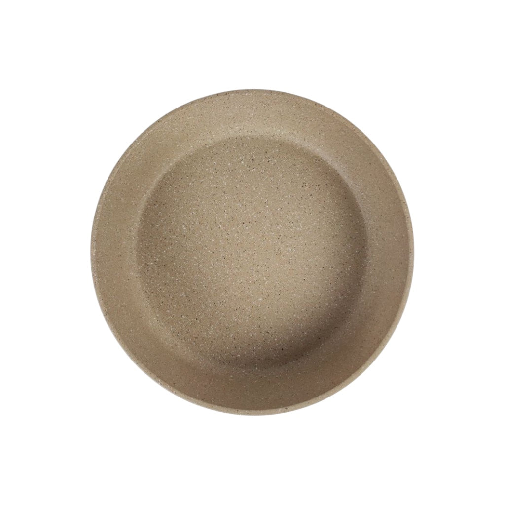 Round beige object on a white background