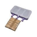 Purple ice cube tray with wooden sticks on a white background