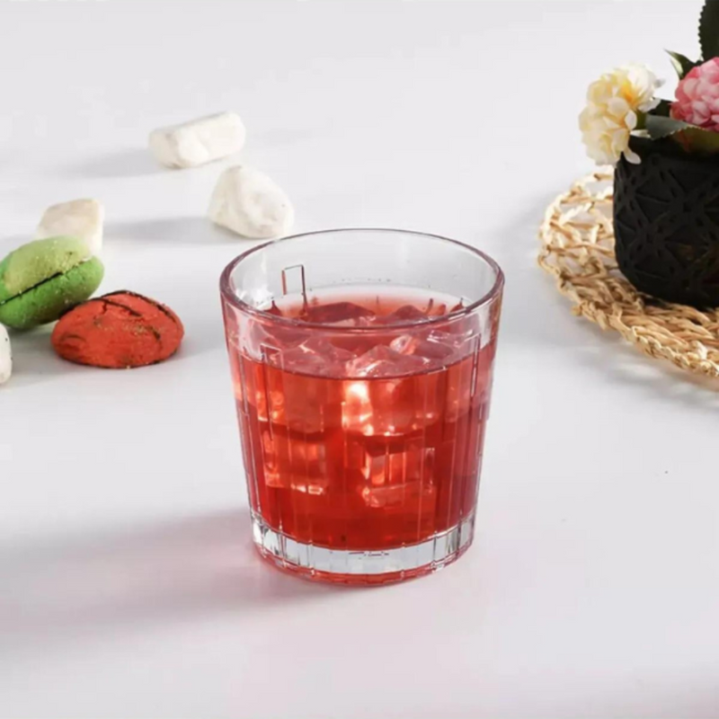 Pasabahce Scala Glass Tumbler Filled With Red Juice And Ice – 300ml Textured Design Cup On White Surface