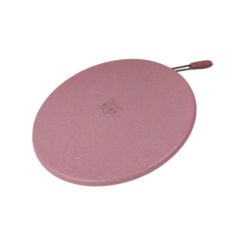 Pink round mat with a handle on a white background
