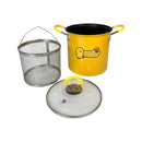 Yellow pot with lid and mesh basket on a white background