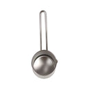 Metallic ladle with a handle on a white background