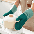 Silicone glove protecting hand from high-temperature surfaces