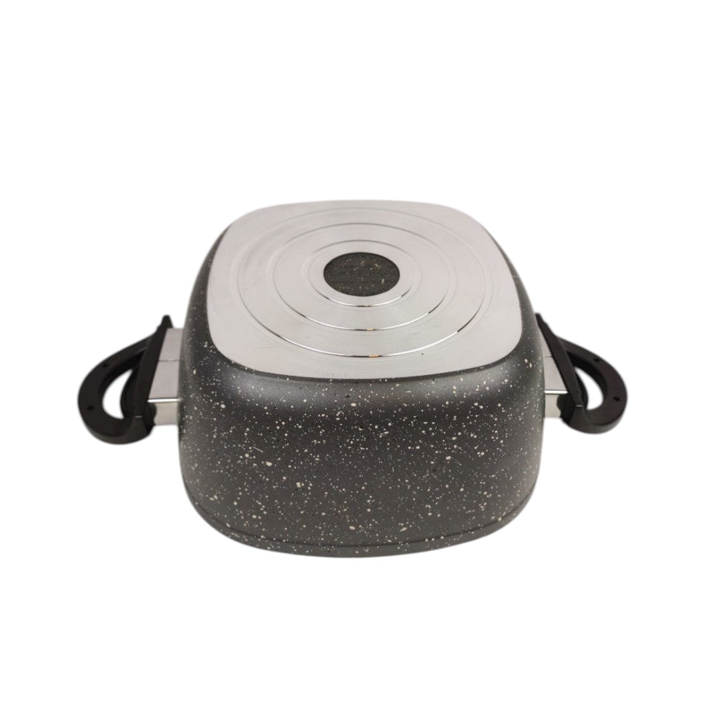Square kitchen tool with speckled black base and metallic top on a white background