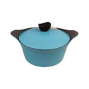 Blue casserole dish with black handles and lid on a white background