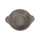 Brown ceramic dish with handles on a white background