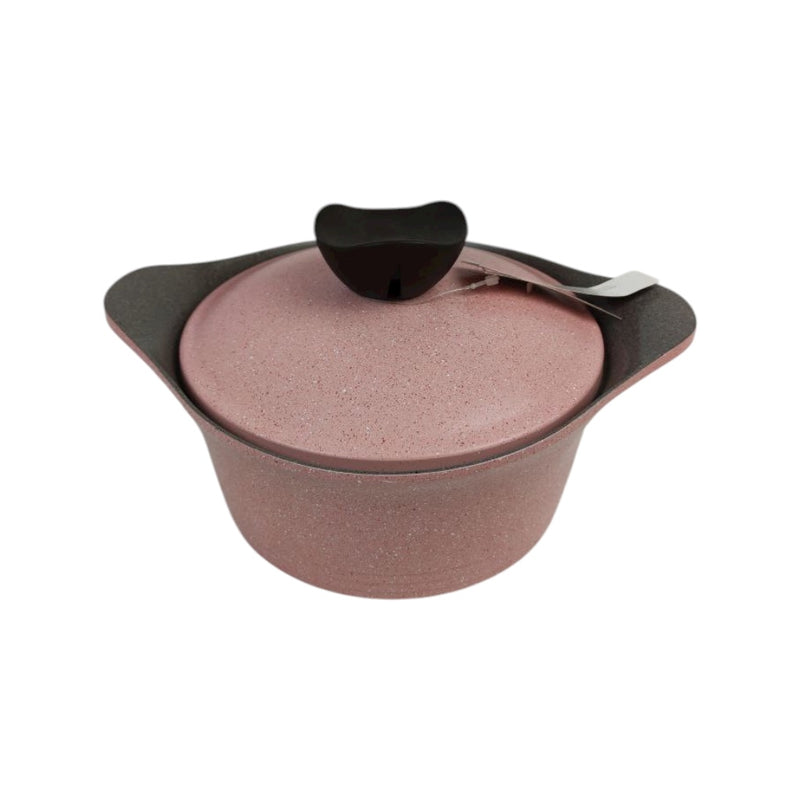 Pink ceramic pot with black lid on a white background