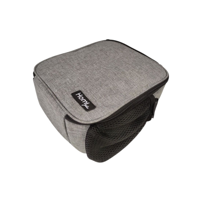 Gray pet carrier with black mesh side on a white background