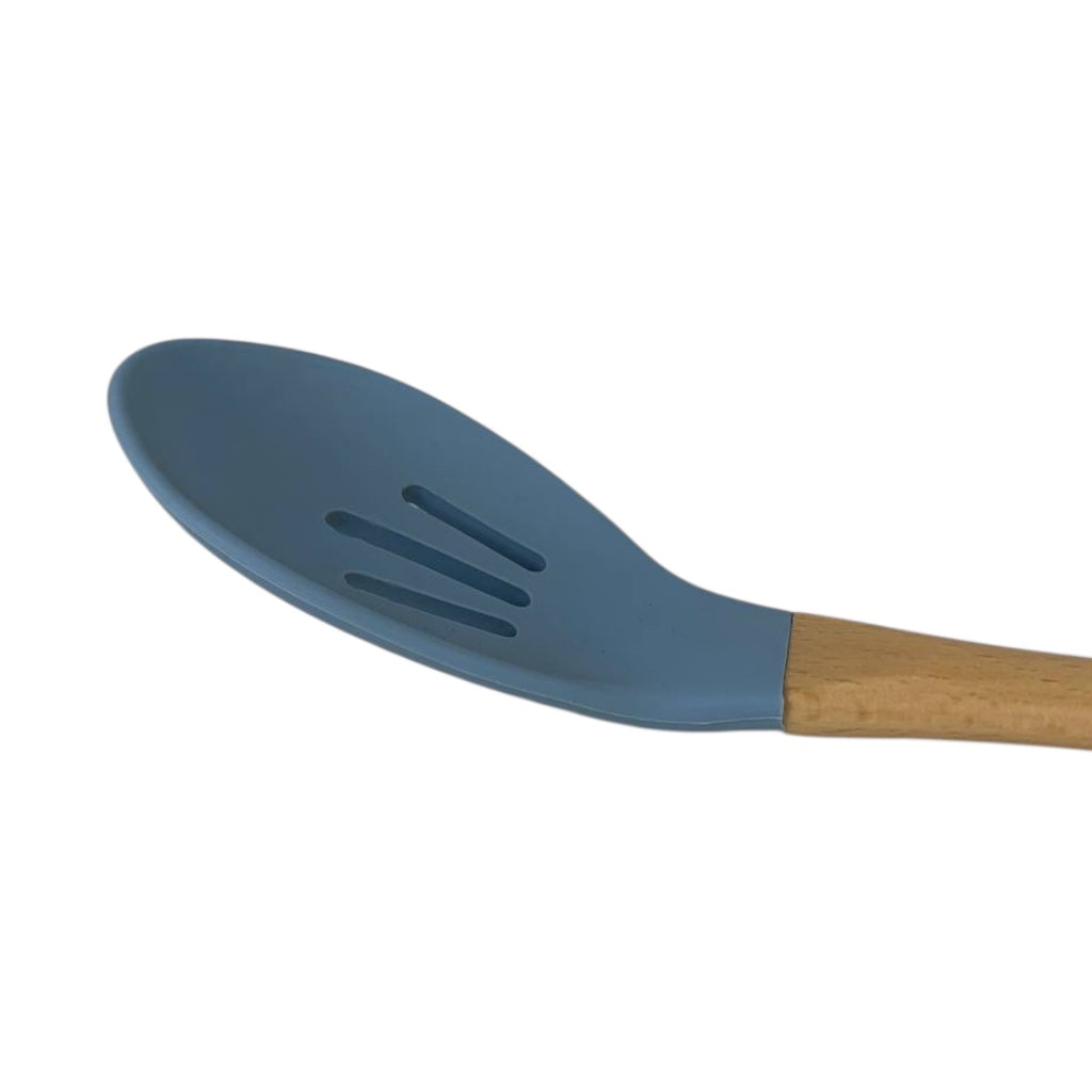 Blue silicone spoon with wooden handle on a white background