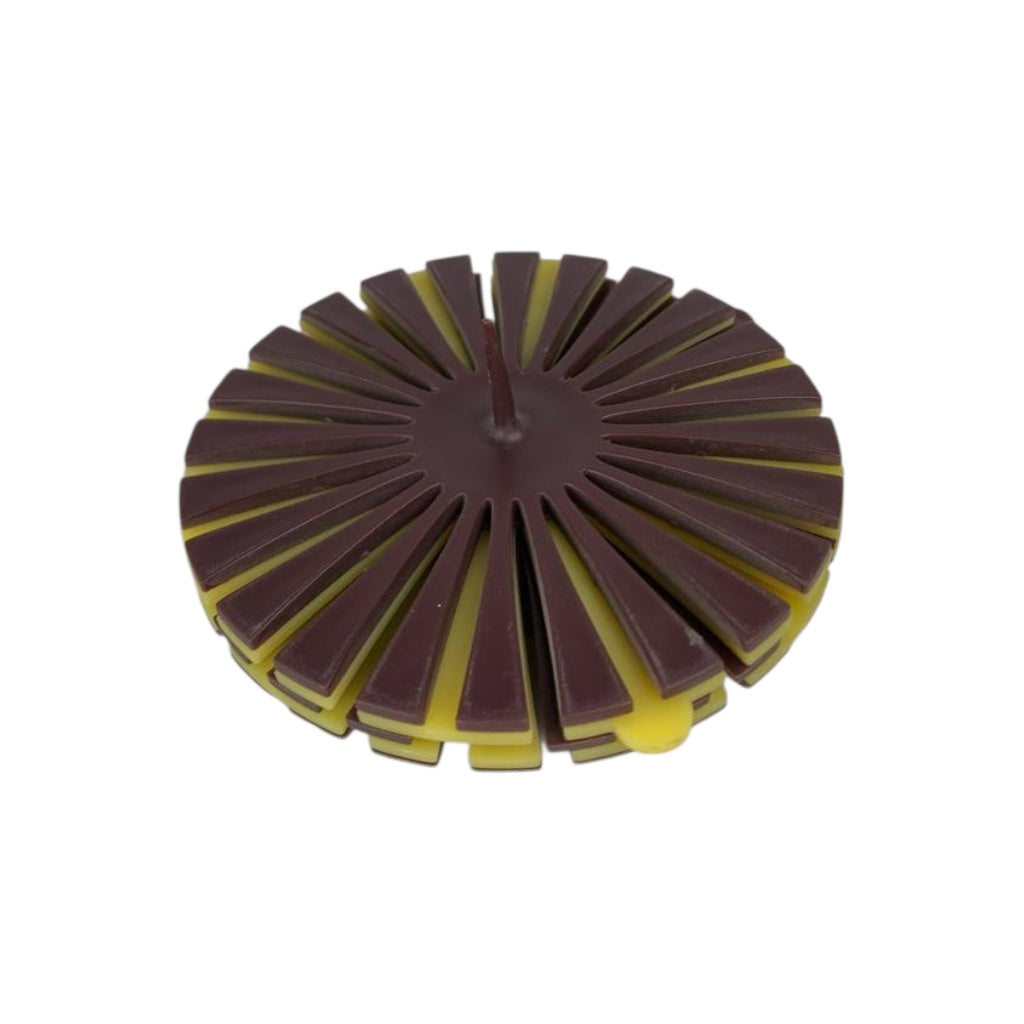 Round object with layered design on a white background