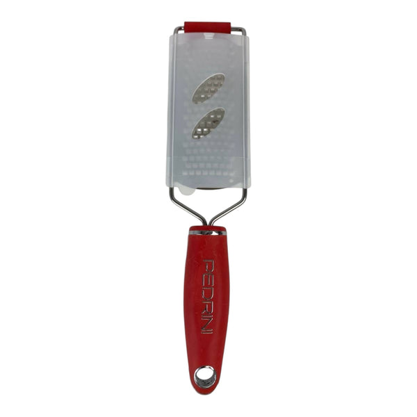 Red and silver zester on a white background
