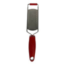 Metal grater with red handle on a white background
