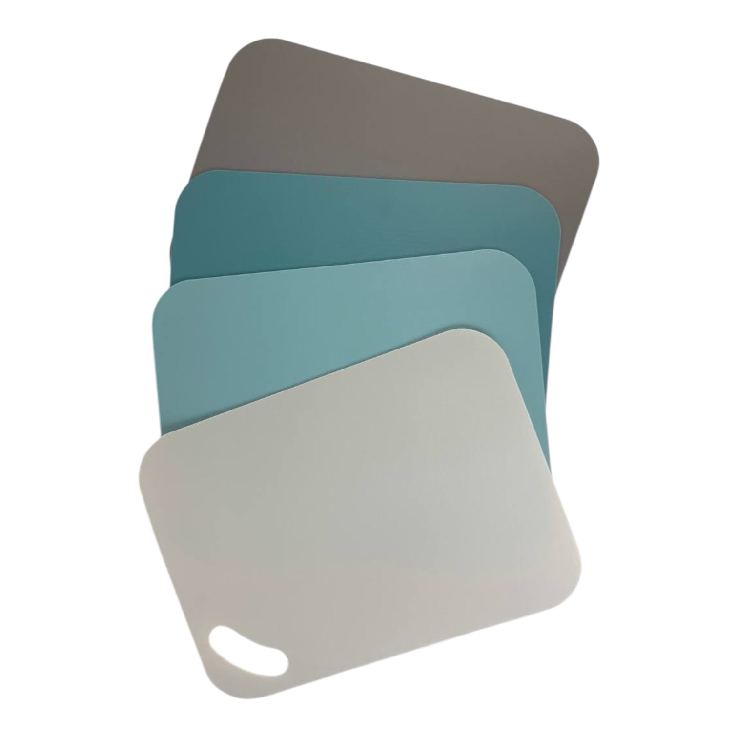 Set of four rectangular cutting boards in gray, teal, and white on a white background