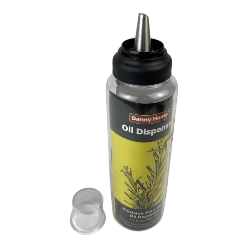 Oil dispenser bottle with black cap and yellow label on a white background