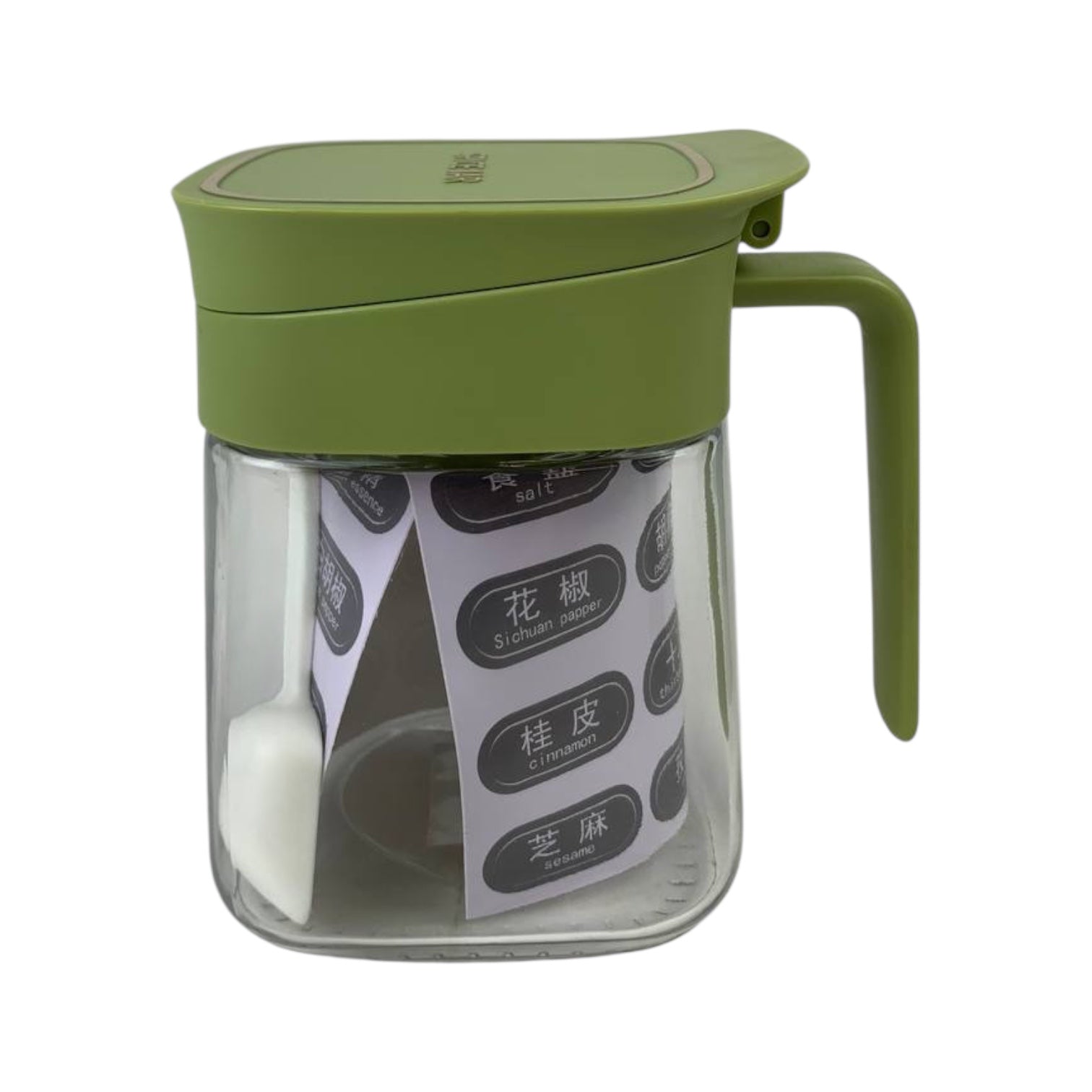 Green spice jar with a clear container on a white background