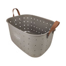Basket with brown handles and perforated design on a white background