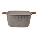 Gray storage container with lid and brown handles on a white background