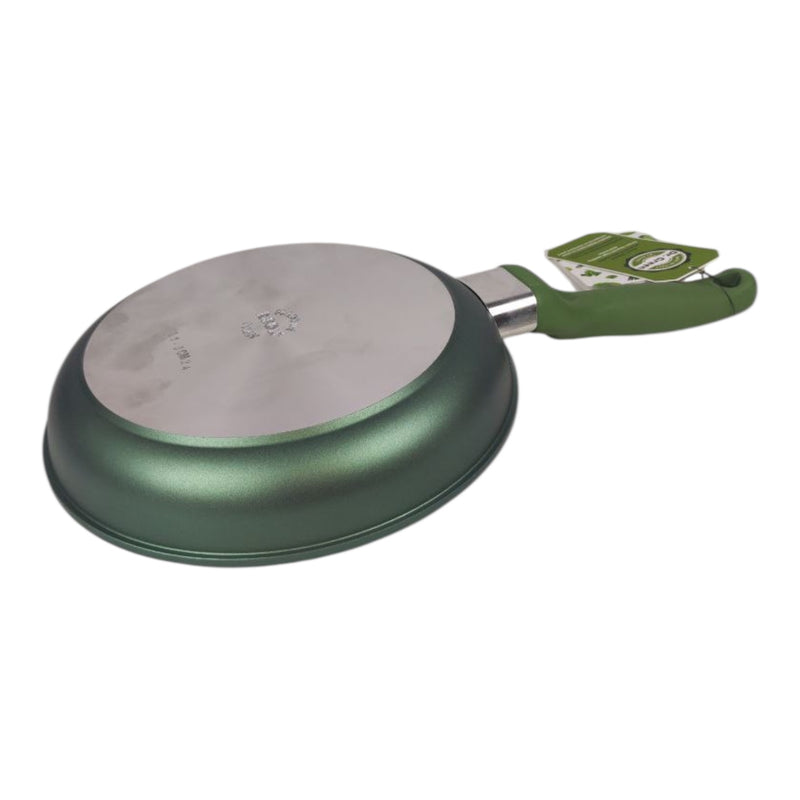 Green frying pan with a handle on a white background