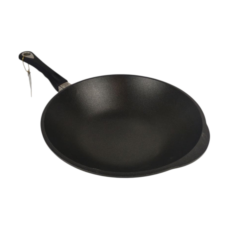Black wok on a white background