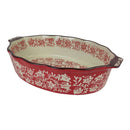 Red floral-patterned ceramic dish on a white background
